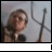 A pixelated animated sequence shows a person in a suit with microphones, transitioning through text overlays from 'I' to 'BRICKILLED A GUY!' against a light blue background.