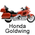 A static contact sheet of two identical motorcycle icons with text labels, displayed on a white background with gray transparency sections.