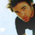 A pixelated image of a person with dark hair and red lips wearing a black shirt, with the word "TWILIGHT" in bold red text below.