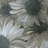 Pixelated grayscale image with abstract light and dark patches, no discernible subjects or text.