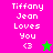 Pixelated text "Tiffany Jean Loves You <3" with a star symbol on two color backgrounds, one pink and green split vertically.