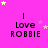 A bright pink background with repeated text "I Love ROBBIE" in black pixelated font, surrounded by small yellow and light purple stars.