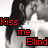 nine grayscale images showing a couple kissing, with text overlays changing between 'Kiss me Blind' and 'Time after Time' in red and black fonts