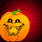Animated pumpkin face with green stem, black eyes, and a wide mouth showing teeth; ghost appears over lower-left pumpkin.