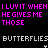 A static digital image with repeated text patterns in pink and white on a black background, featuring alternating of 'LUXIT WHEN I LUXIT WHEN' and 'HEGIESME THOSE' above and below 'BUTTERFLIES' text