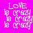 A static image with a bright pink background displays the word 'LOVE' in large white pixelated letters at the top, followed by four instances of the word 'crazy' stacked vertically below it.