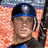 A pixelated image of a person in a blue cap and dark clothing against an orange background with scattered text elements.
