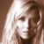 A 2x2 contact sheet of a pixelated animated icon featuring a woman with long blonde hair and the text "CoolBuddy.com" on a blue background, displayed across three sampled frames showing subtle facial expression changes.