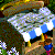 Pixelated image of a hotdog stand with blue and white toppings, brown base, green background elements, and scattered colorful pixel clusters.