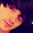 Pixelated image of a person with dark hair and light skin on the left, next to bright yellow background with orange text reading 'Drake Bell<3'.