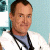 A pixelated contact sheet showing two frames of an animated icon featuring a person in medical attire and green text on a dark background.