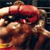 Pixelated static image of two boxers in mid-fight with red and white color scheme on dark background.