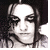A static image shows a person with long dark hair and heavy eye makeup on the left, next to red text reading "i got my bestfriend into punk!" on a gray background.