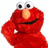Pixelated red muppet-like character with large white eyes and orange nose, positioned left of text blocks on white background.