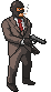 Pixel art of a masked figure in a brown suit holding a pistol, with visible smoke from the mouth and muzzle flash during firing.