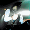 Animated sequence showing a figure in dark clothing with light blue sleeves holding a glowing object, with text changing from "IF YOU CAN'T STAND UPON THE WATER" to "I WILL SEE YOU ON THE OCEAN FLOOR".