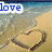 Beach scene with heart drawn in sand, waves lapping shore; text overlays change across frames.