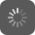 A circular dark gray icon with a radial pattern of light and medium gray bars forming a spinning wheel effect.
