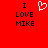 Red background with black text "I LOVE MIKE" on both sides and a white pixelated heart symbol in the center.