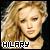 Pixelated static image of a person with light brown hair and closed eyes, featuring the text 'HILARY' in blocky white letters at the bottom.