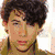 A pixelated image of two people embracing on the left, with a patchwork background and text elements reading 'PLUS' and '= TRU LOVE!' on the right.