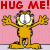 Pixelated cartoon cat character with outstretched arms on pink background, red text "HUG ME!" above.