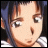 Pixelated anime-style character face with brown hair and light skin, next to stylized text on a black background.
