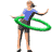 A woman in a blue shirt and dark shorts spins a green hula hoop around her waist