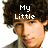 A pixelated image of a person with curly brown hair, wearing a gray shirt, with text overlaid on the head.