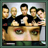Group of six men in black shirts with one holding a small object, transitioning to close-ups of individual faces.