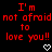 Red pixelated text on black background reads "I'm not afraid to love you!!" with two white heart symbols below.