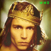 A four- shows a person with long brown hair wearing a golden crown, each displaying different text above the head