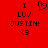 Red background with black pixelated text and symbols: 'I LUV JUSTIN!' above a heart symbol, then the heart disappears while other elements remain.