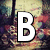 Pixelated text spelling 'BONNIE' in bold white letters with black outlines over a blurred, colorful background of indistinct figures.