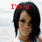 A four- shows a person with dark shoulder-length hair against a light background, with red pixelated text reading "I'm a fan of Rihanna!" across the