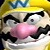 Pixelated close-up of a cartoon character with a large pink nose, black mustache, and yellow cap, mouth open in a wide grin.