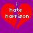 Two identical pixelated red broken hearts on purple background with white text "i hate harrison" inside each heart.