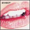 A close-up of lips with glossy red lipstick, showing teeth and a white tongue, with the word 'SWEET' in pixelated black text at the top left.