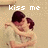 Two pixelated figures embrace; text above changes from 'kiss me' to 'gently...' as the scene shifts.