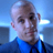 Static 48x48 pixel icon of a person with short light hair wearing blue clothing against a gradient background.