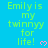 A static image with a bright blue background displays repeated green text reading "Emily is my twinnyy for life!" accompanied by small pink heart symbols.