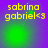 Yellow text 'sabrina gabriel<3' on purple-green gradient background with shifting green light effects.