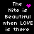 Pixelated text reads "The Nite is Beautiful when LOVE is there" with pink heart and starburst icons on black background.