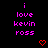 Pixelated text and heart symbols arranged in a on a black background with a gray corner element