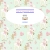 A pixelated image with a light green background featuring faint pink and brown floral patterns, centered around a white oval shape containing layered purple and blue horizontal bars.