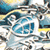 Pixelated static image of a blue and white character with yellow accents in a dynamic pose, likely from an anime-style game avatar collection.