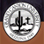 Circular icon with pixelated silver border and white center containing black abstract symbol resembling stylized letters or geometric shapes.
