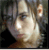 Pixelated static image of a person's face with light skin tone, dark hair, and visible facial features including eyes, nose, mouth, and ear, set against a dark background with subtle color variations.