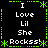 Black background with green dashed border and asterisk accents, displaying repeated white text 'I Love Lil She Rockss!' in a pattern