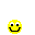 Yellow pixelated face with multiple expressions including smiling, winking, tongue-out, and closed eyes on gray background.